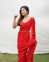 Majestic chikankari and handwork heavy georgette Cherry Red saree
